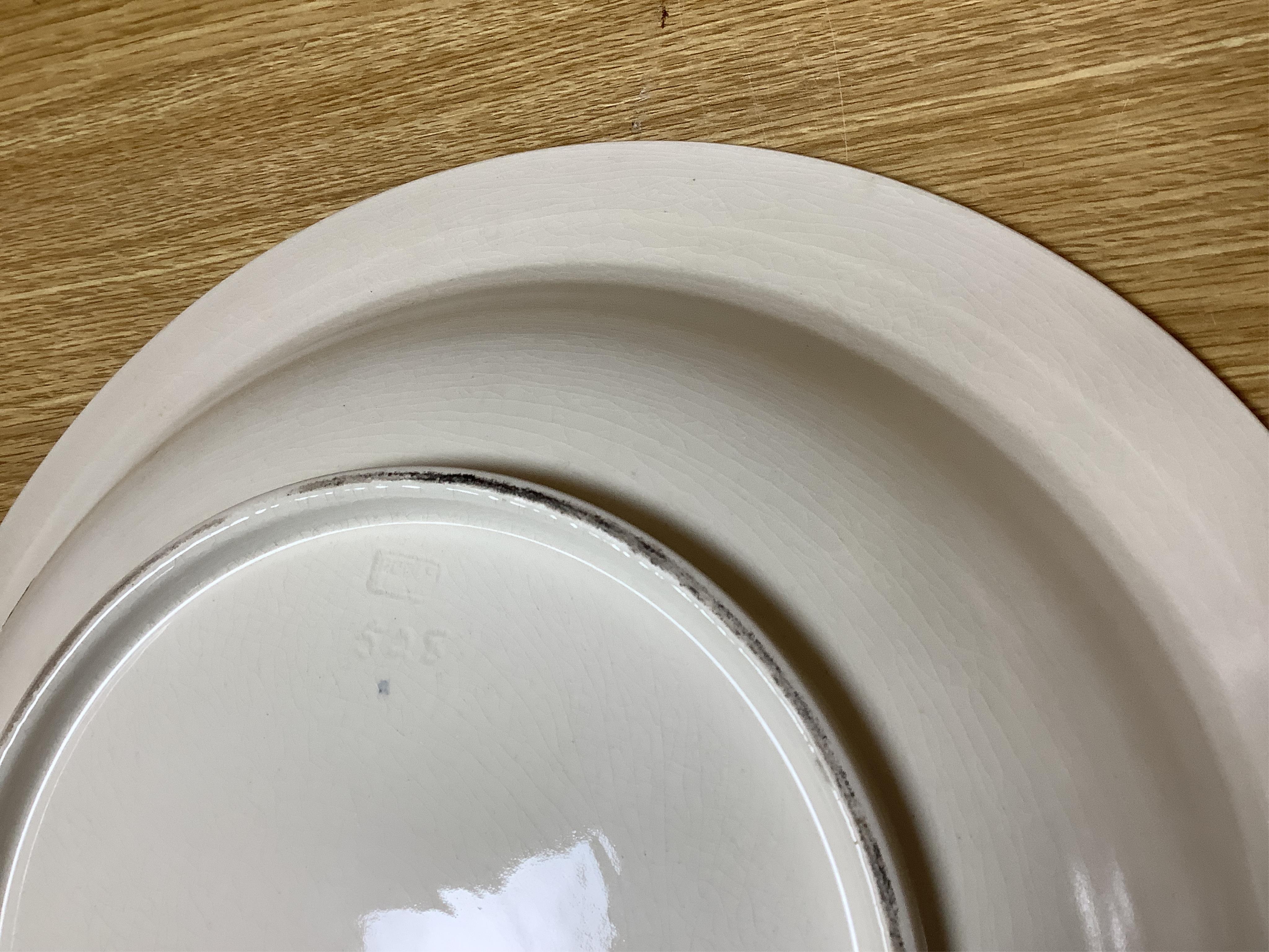Olive Bourne for Poole pottery ‘sugar for the birds’, a large dish, stamped to the base, 38cm in diameter